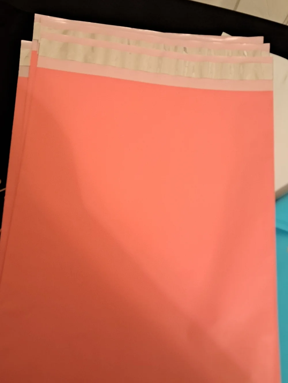 16 ct - Blue, Coral, White and Black 10x13 polymailers. Four of each color.